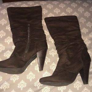Calf length heeled boots